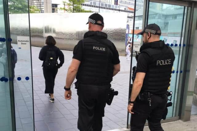 Armed police at Sheffield railway station. Photo courtesy of BBC