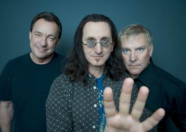 __ Caption: Progressive rock band RUSH. From left to right: Neil Peart, Geddy Lee and Alex Lifeson. 2012.  Email: mtarradell@dallasnews.com Phone: 214-977-8798 OrigName: 1352928022_0856168001352928022_0.jpg Name: rush--pub-4--andrew-macnaughtan-extralarge_1311806313206.jpg Byline: Andrew MacNaughtan Submitter: Mario Tarradell Timestamp: 2012-11-14 15:20:22 Section: GUIDE LIVE_NGL