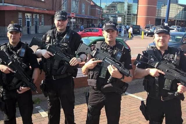 Armed police.