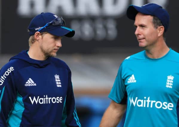 England skipper Joe Root chats with former England captain Michael Vaughan