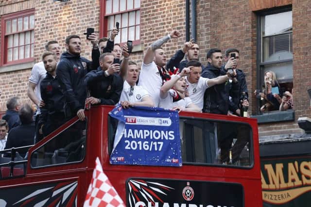 Sheffield Utd players during the open top bus parade from Bramall Lane Stadium to Sheffield Town Hall, Sheffield. Simon Bellis/Sportimage