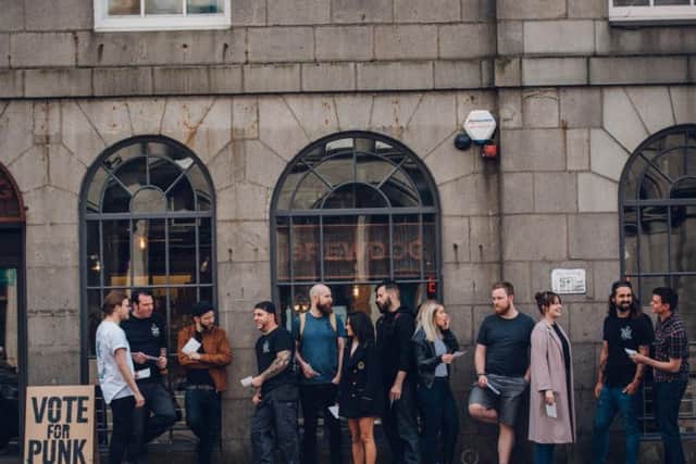 Voters outside a bar - Credit: BrewDog