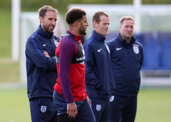 Kyle Walker (centre) is away on England duty