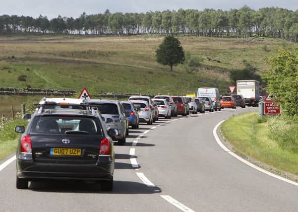 Traffic for the Chatsworth RHS Flower Show queueing on the A621 between Sheffield and Baslow