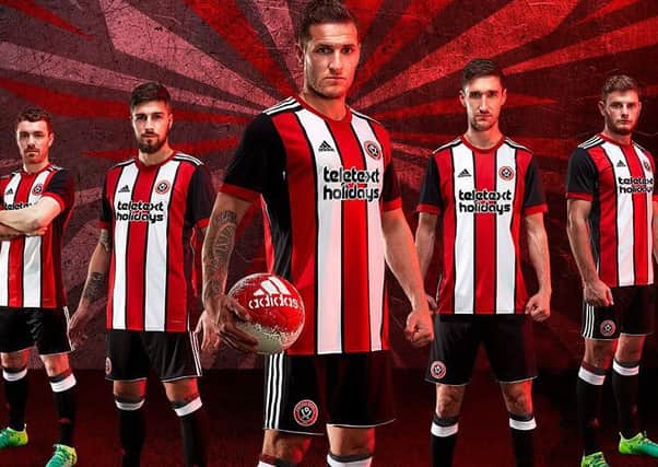 Sheffield United players model the club's new home kit for the 2017/18 season