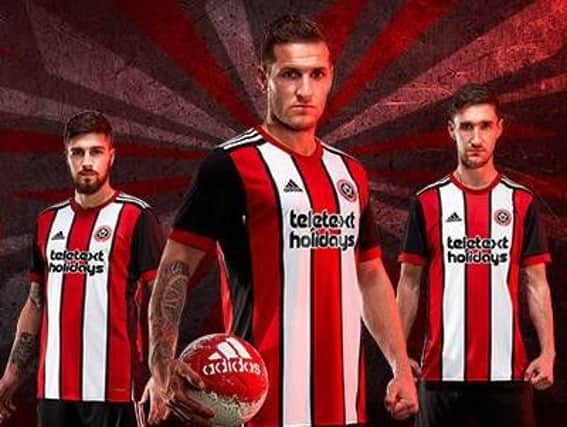 Sheffield United players model the club's new home shirt for the 2017/18 season