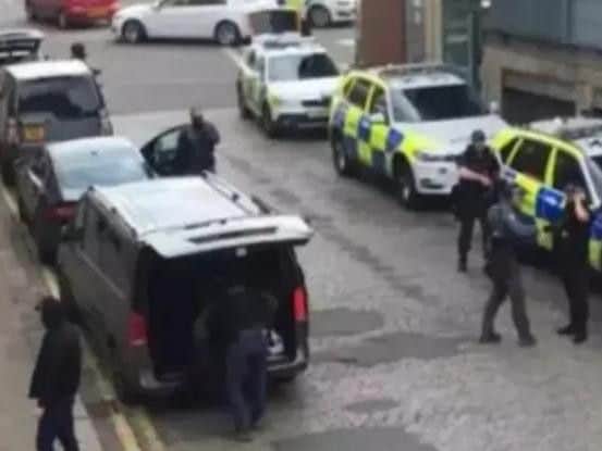 Police during the raid at Kelham Island.