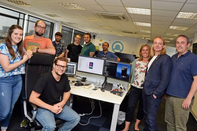 Dr. Sam Chapman, Chief Innovation Officer and Co-Founder, Michelle Futter, HR Leader, Paul Say, Marketing Leader, of The Floow, pictured with some of the team at the Floow headquarters. Picture: Marie Caley NSST Floow MC 3