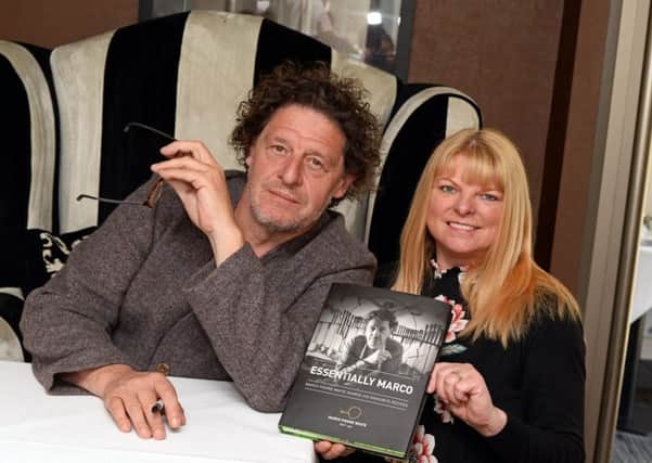 Marco Pierre White pictured with diner Lynn Martin, at his restaurant Marcos. Picture: Marie Caley NSST Pierre White MC 1