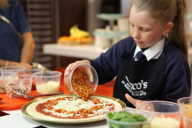 Rhia Haines, aged nine, a primary school pupils from St Marys C of E Academy, Walkley, who created a pizza for chef Marco Pierre White at his New York Italian restaurant, West Bar Green, Sheffield.