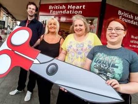 Darren Ledger, Carol Mappin, Sue Land and Jodie Langton launch The Big Stitch outside the BHF shop in Pinstone Street, Sheffield (BHF)