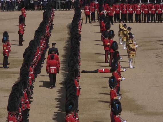 Guardsman faints after Trooping the Colour ceremony - Credit: PA/PA Wire