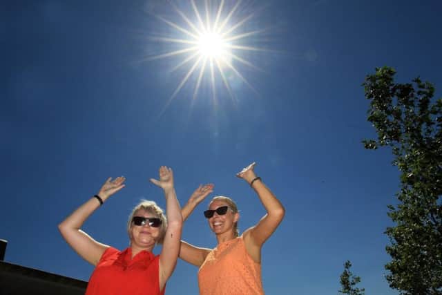 Fun in the sun at Sir Nigel Gresley Square in Doncaster. Pictured are Emily Thompson and Karen Sinden.