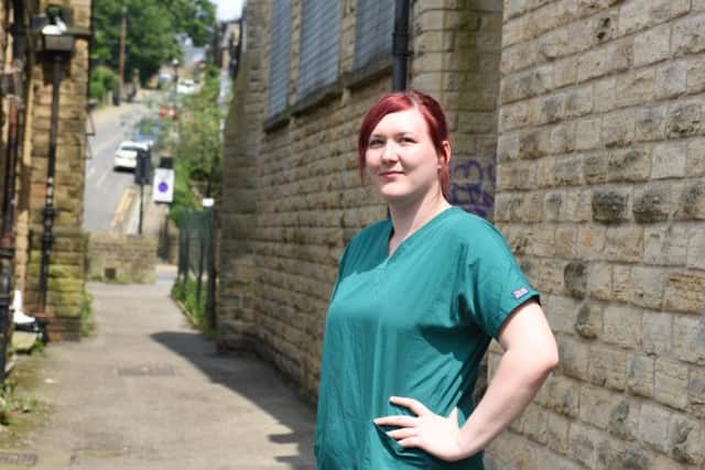 Jess Cambridge said she would feel safer if there was lighting or a camera installed in an alley near her work on Ecclesall Road.