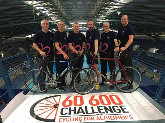 The cycle team on the 10 metre high board at Ponds Forge in Sheffield.