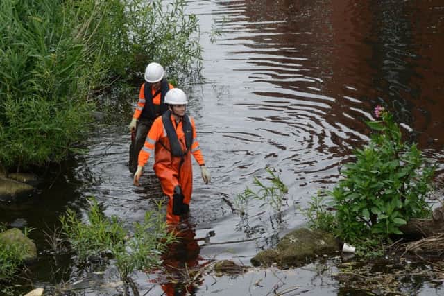 20 June 2017.....Ten years after the Sheffield floods that claimed two lives, a volunteer group has been meeting each week to clear the River Don of rubbish that contributed to the disastrous flooding.Pictured Rochelle Kent-Ellis and Jade Roche. Picture Scott Merrylees