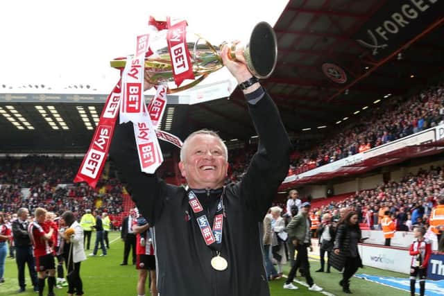 Sheffield United's Chris Wilder with the League One title. Pic David Klein/Sportimage