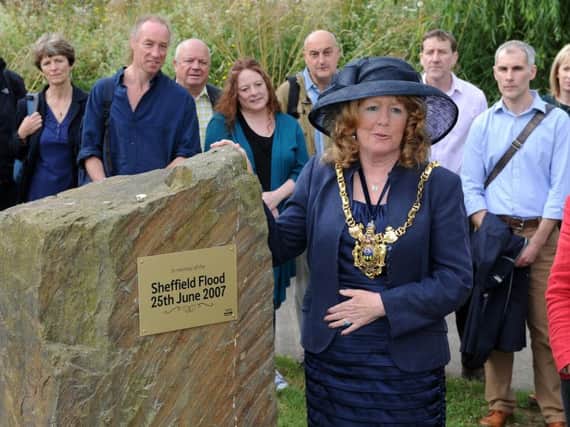 Sheffield's lord mayor Coun Anne Murphy unveils a plaque commemorating the 10th anniversary of the 2007 flood