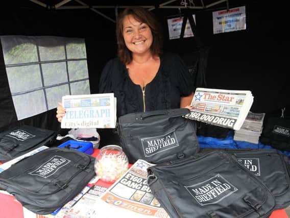 The Star's Andrea Moon selling copies of the paper.