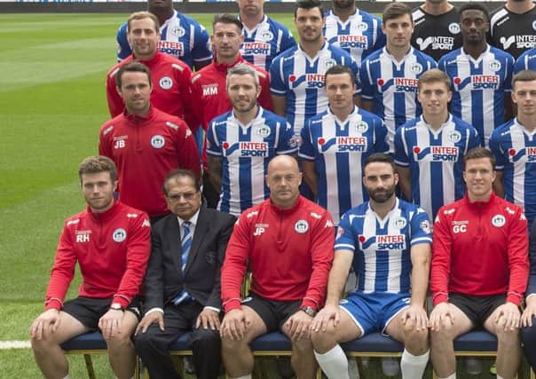 Top left is Chesterfield's pre-season fitness coach Gareth Piper, alongside new head of physiotherapy and performance Michael McBride. Gary Caldwell is bottom right, in the 2015/16 Wigan photocall.