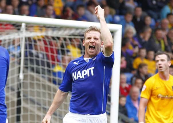 Ritchie Humphreys celebrate's the Spireites first goal against Oxford by Tina Jenner Oxford Utd v Chesterfield
