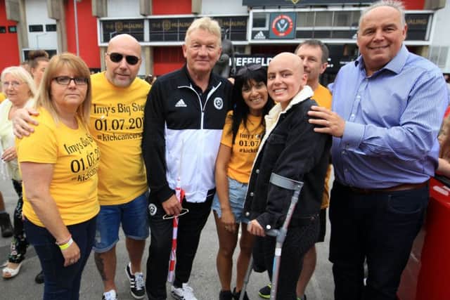 A sponsored walk for Imogen Ellis set off from Sheffield United ground at Bramall Lane on Saturday morning. Pictured are Rachael Shephard and Kim Clayton. Imogen is pictured with family, friends and former fotballers Tony Currie and Mel Sterland