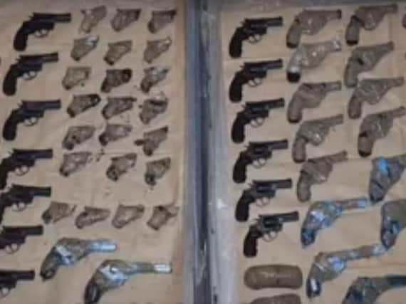 Some of the 79 guns seized before they could be brought to the UK