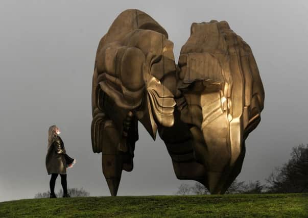 Exhibition by Tony Cragg at the Yorkshire Sculpture Park, Wakefield.Millie Carroll looks at the sculpture named Caldera 2008..2nd March 2017 ..Picture by Simon Hulme