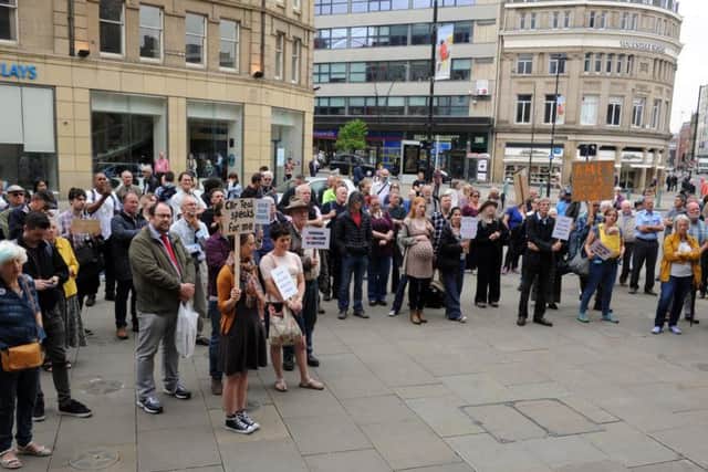 Campaigners gather outside the Town Hall.