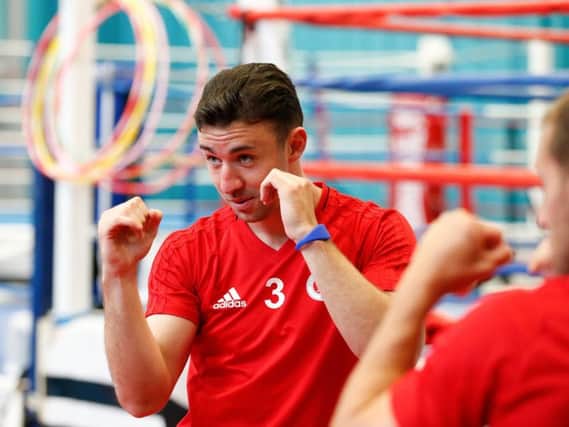 Enda Stevens perfects his stance as Sheffield United's player take their pre-season training to the boxing gym at EIS. Simon Bellis/Sportimage