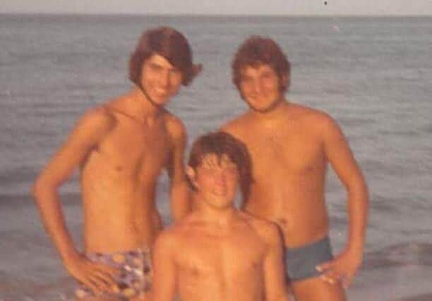 David with Christakis (left) and another friend on the beach in Cyprus