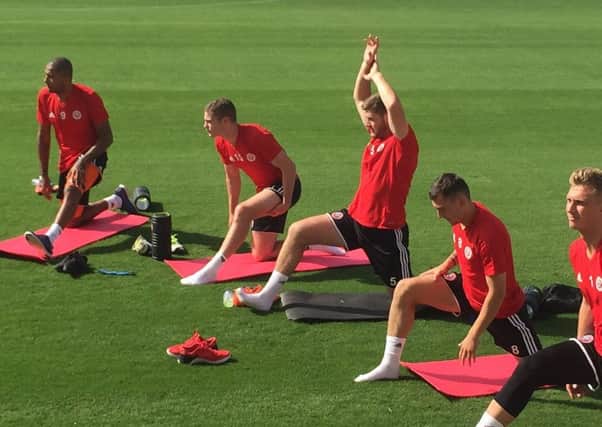Sheffield United players warm up at the pre-season training camp in Marbella