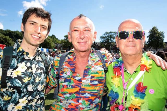 Ashley, Brian and Les enjoying Pride in Endcliffe Park, Sheffield, United Kingdom on 30 July 2016. Photo by Glenn Ashley Photography