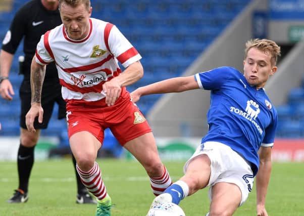 Picture Andrew Roe/AHPIX LTD, Football, Pre Season Friendly, Chesterfield Town v Doncaster Rovers, Proact Stadium, 29/07/17, K.O 3pm

Doncaster's Gary McSheffrey is tackled by Chesterfield's Louis Reed

Andrew Roe>>>>>>>07826527594