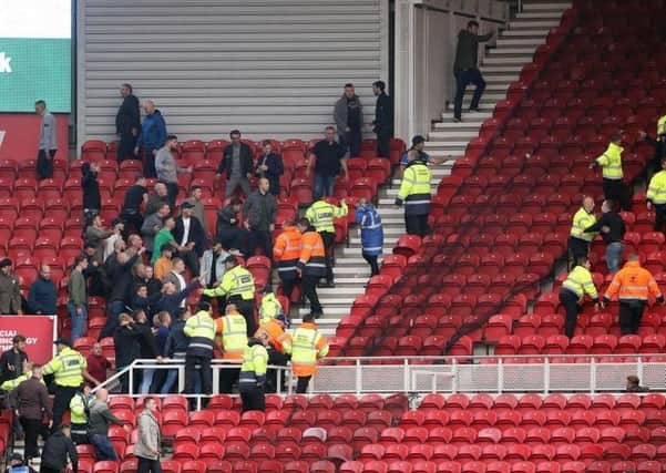 Violence at the Riverside Stadium. Picture: PA