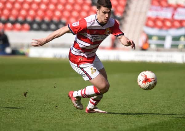 Tommy Rowe in action for Doncaster Rovers