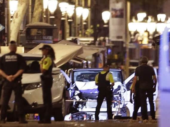 A manhunt is underway for the van driver involved in a terror attack in Spain last Thursday