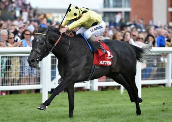 Defoe, ridden by Andrea Atzeni, storms to victory at Newbury on Saturday to set up a tilt at the William Hill St Leger at Doncaster next month.