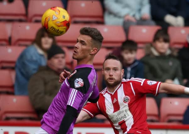 Harry Toffolo, left, pictured during his spell at Swindon.