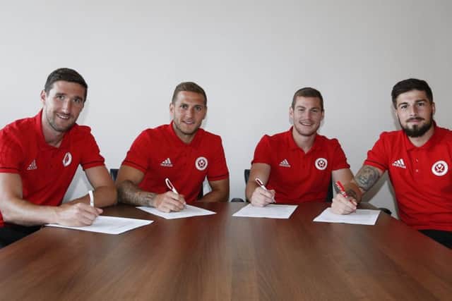 Chris Basham, Billy Sharp, Paul Coutts and Keiran Freeman as they sign new contracts: Simon Bellis/Sportimage