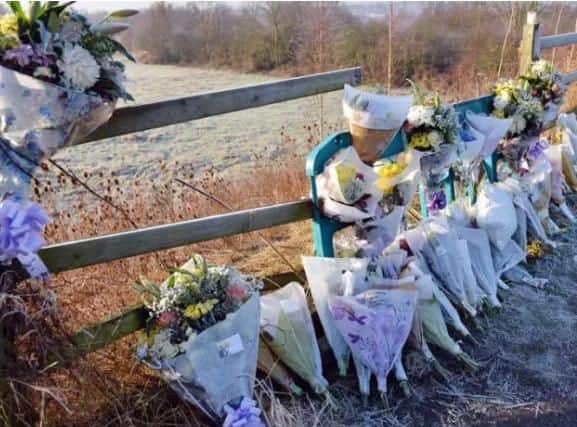 Floral tributes left at the scene of the crash in Station Road, Killamarsh