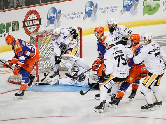 Get in: Steelers close in on Panthers's goal. Pic by Hayley Roberts.