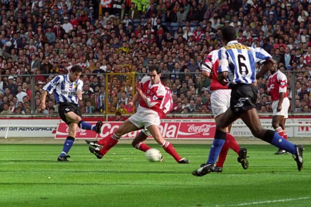 John Harkes strikes the ball home to give Sheffield Wednesday an eighth minute lead