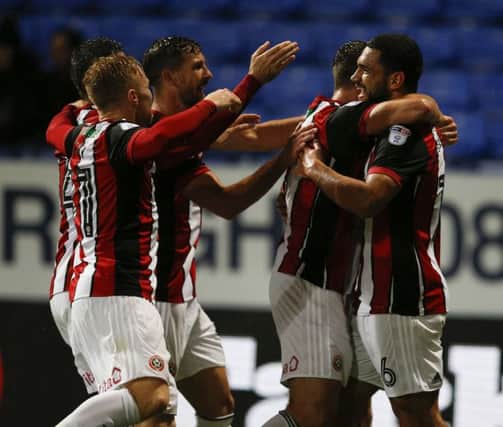 Cameron Carter Vickers celebrates his Sheffield United goal during the Championship match at the Macron Stadium, Bolton. Pic: Simon Bellis/Sportimage
