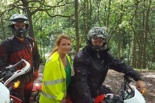 Ms Haigh on patrol with police in woods in Sheffield.