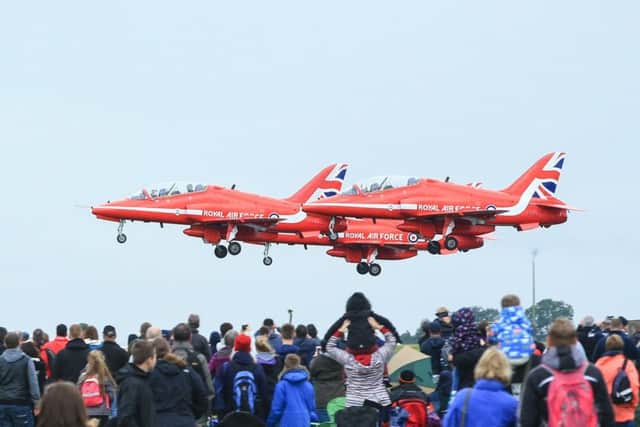 The Red Arrows take off during Scampton Airshow at the Red Arrows home base RAF Scampton in Lincoln. Photo Danny Lawson/PA Wire