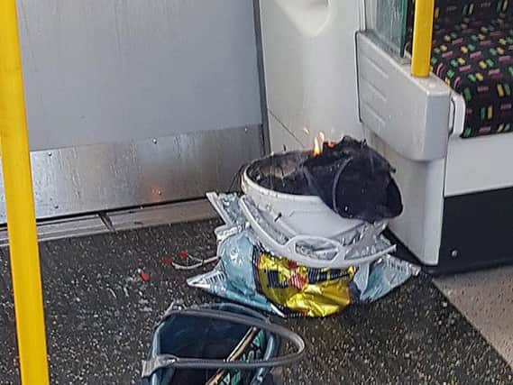 Bag on fire on Underground train - Credit: Sylvain Pennec/PA Wire