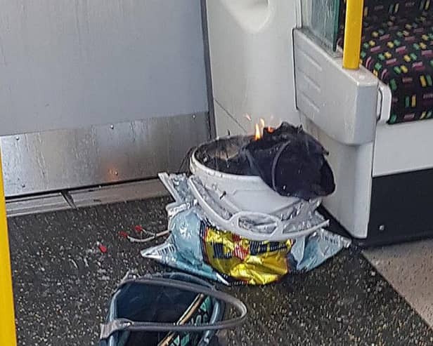 Bag on fire on Underground train - Credit: Sylvain Pennec/PA Wire