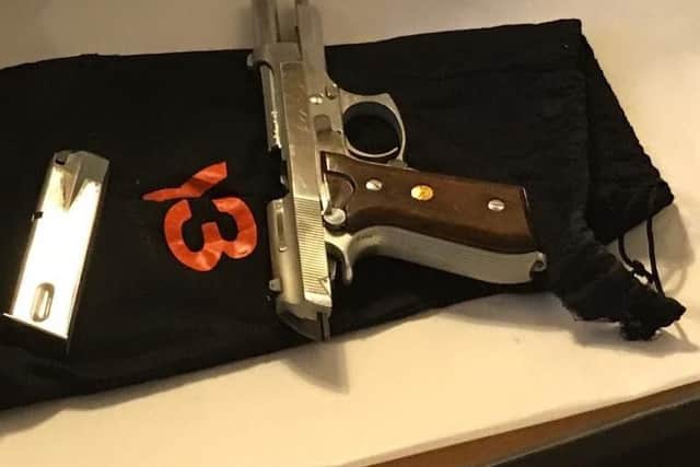 A firearm found in Marcus Jarrett's house