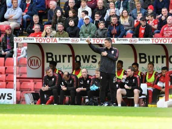 Paul heckingbottom salutes the Barnsley fans during his side's match against Aston Villa